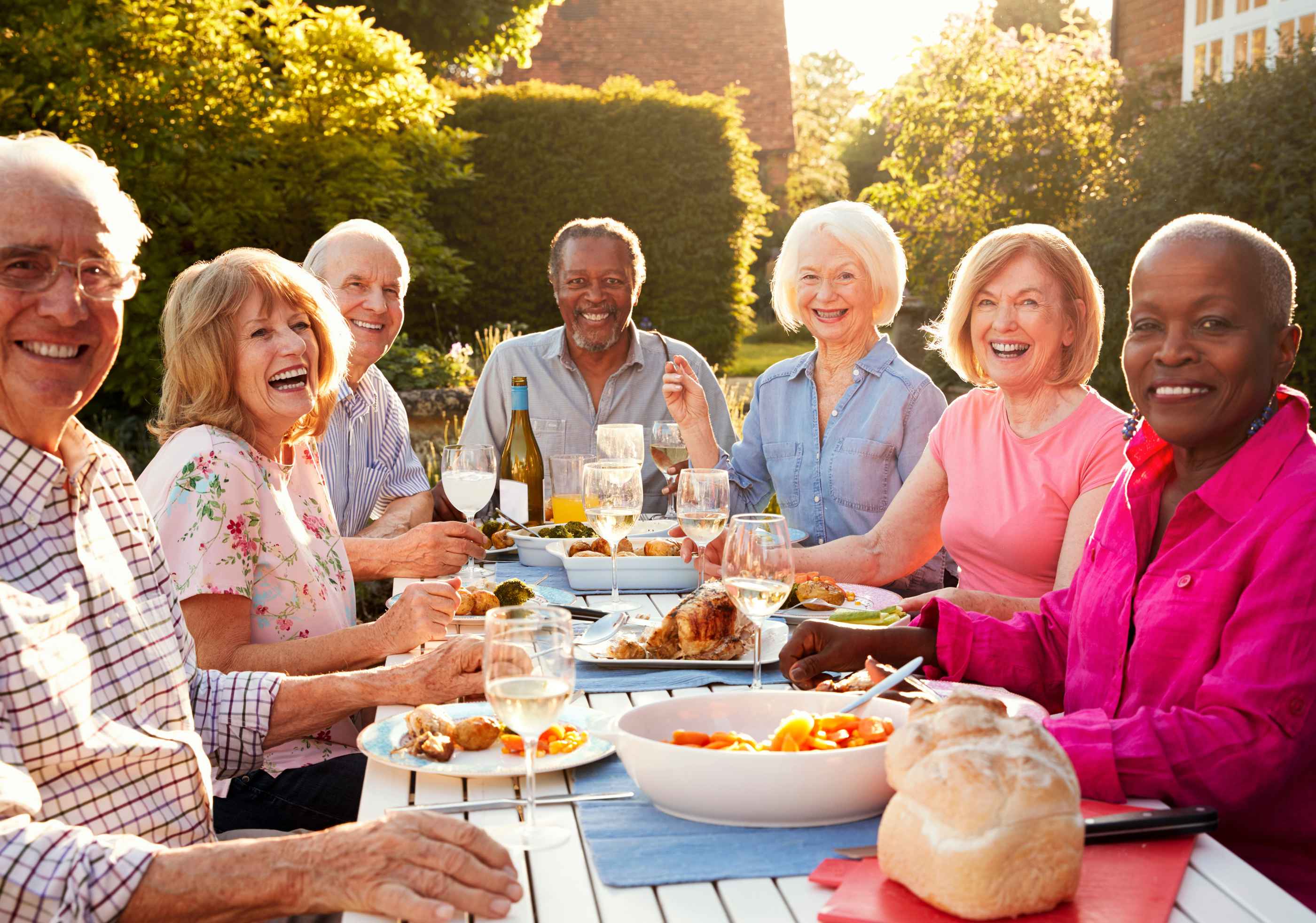 Dining with a Difference family sharing food in the garden