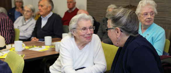 Harlow group smiling and talking