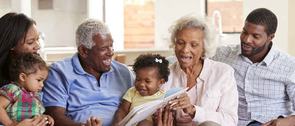 Multi-generational family reading together