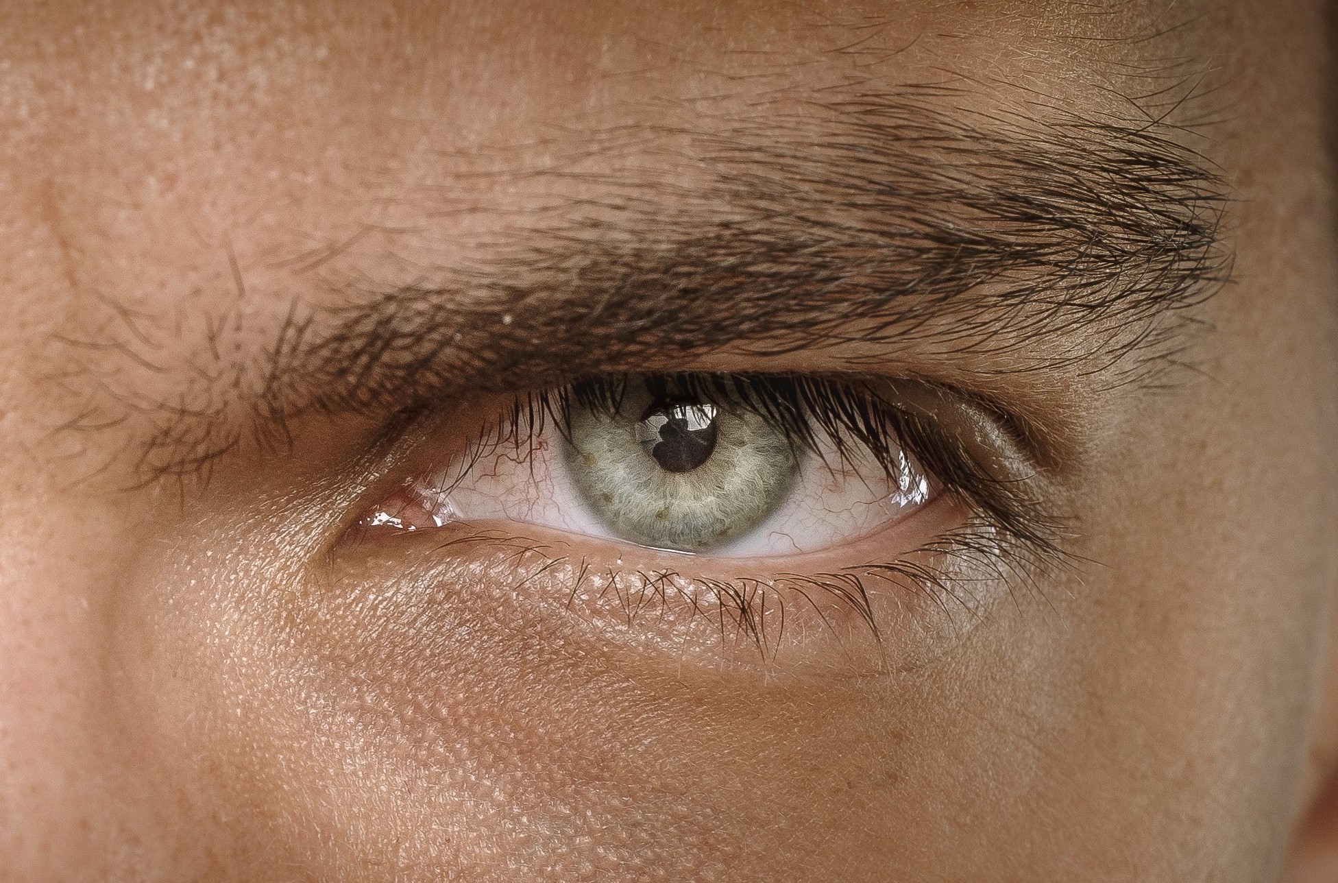 Man with green eyes close up