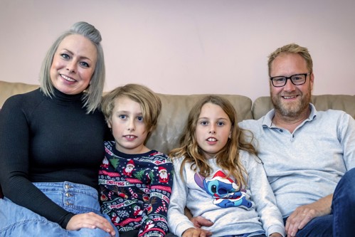 George and Farrah with mum and dad, Sarah and Ollie.