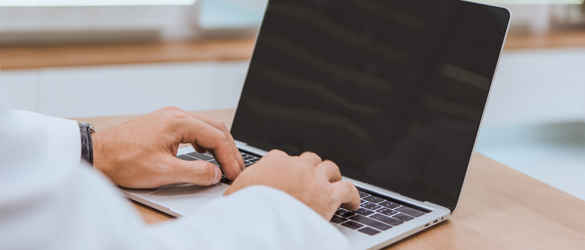 Individual using laptop