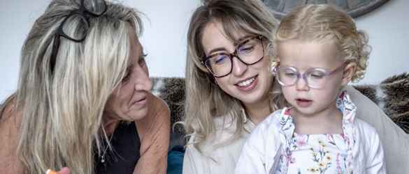 Gill with her daughter and granddaughter playing together